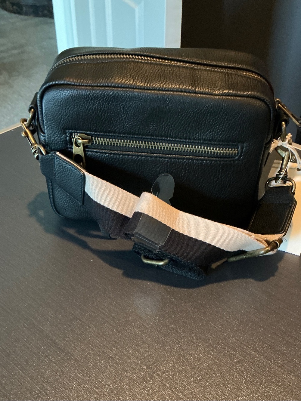 Black Leather Crossbody Bag with Striped Strap